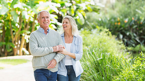 Senior man and senior woman taking a tour at Traditions of Westfield located in Westfield, Indiana