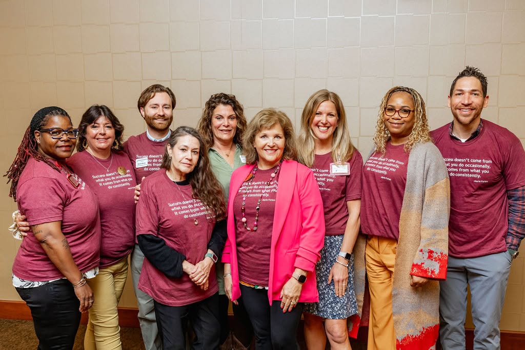 Group of Traditions employees during the annual company meeting